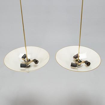Paavo Tynell, a pair of mid-20th century pendant lights for Idman.