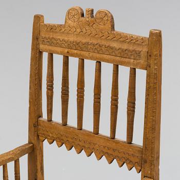 A 18th/19th century wooden chair.