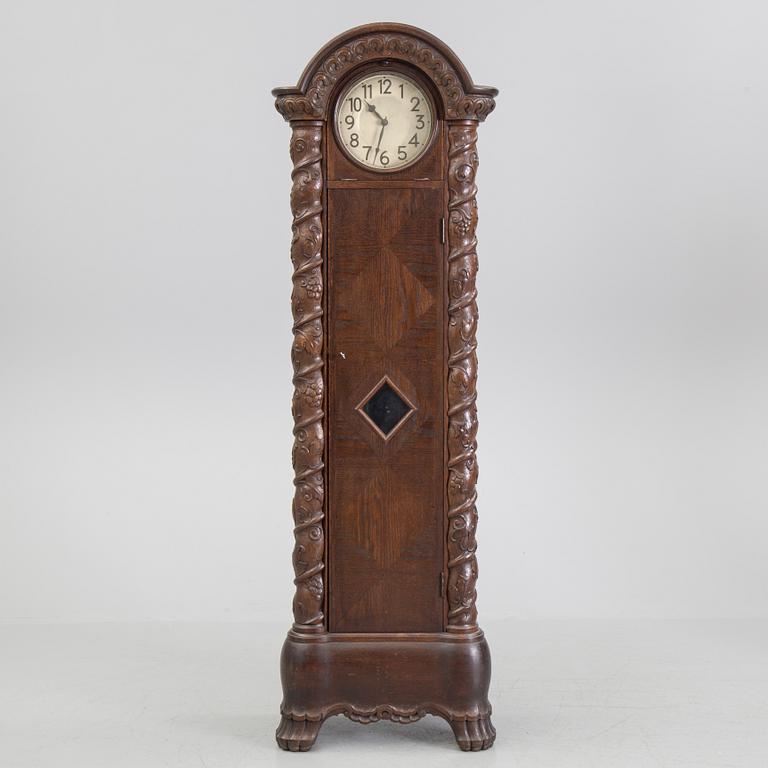 An early 20th century art nouveau grandfather clock.