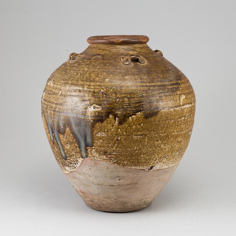 A olive green glazed jar, South East Asia, 18th Century or older.