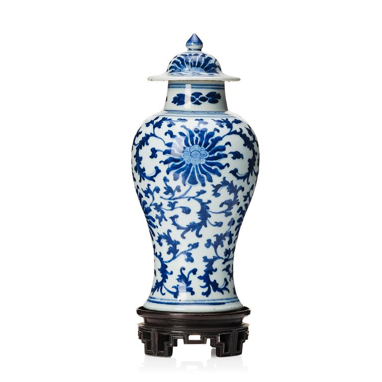 A Chinese blue and white lotus vase with cover, Qing dynasty, 18th Century.