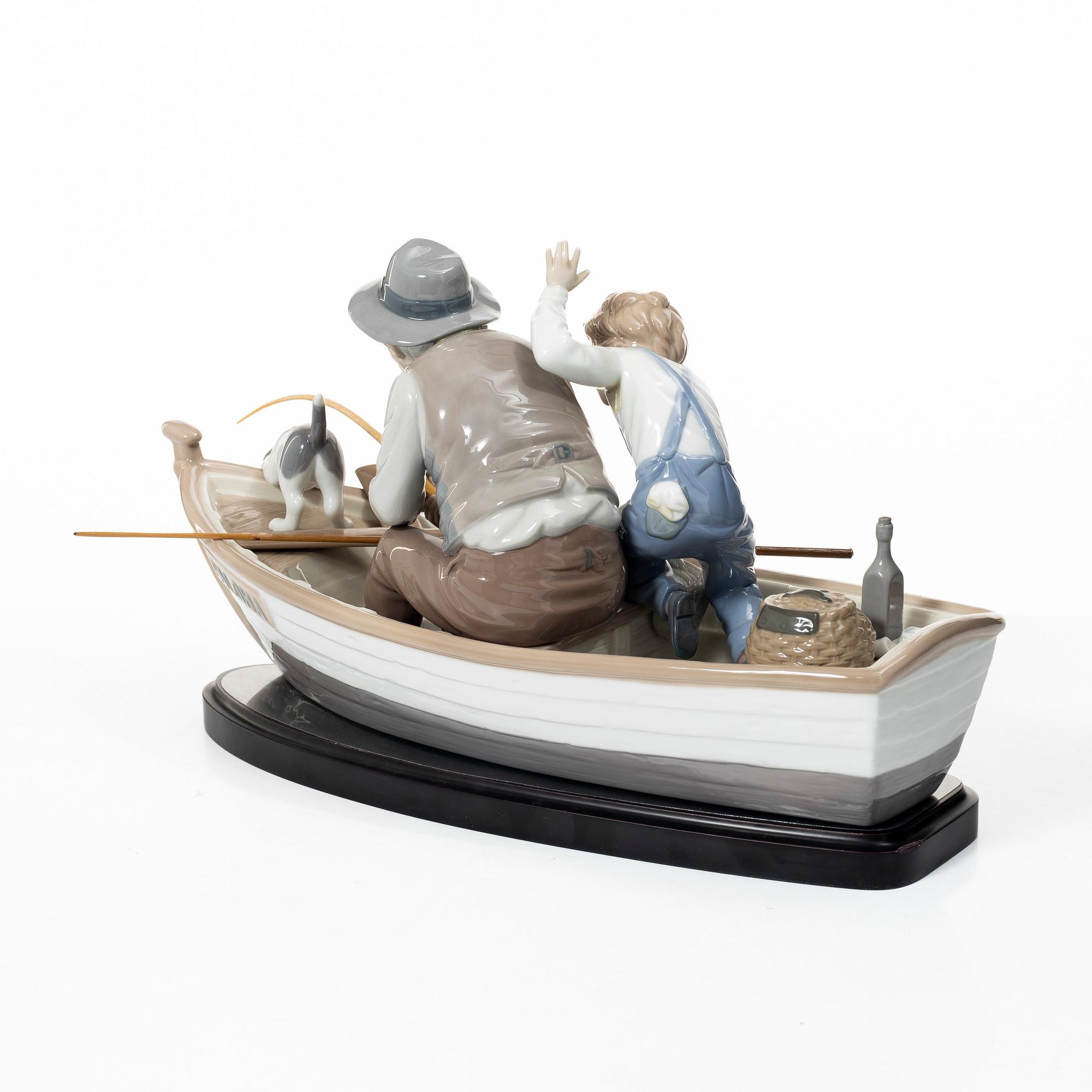 Salvador Furió, figurine, "A fishing lesson", and "A father's pride", Lladró, Spain.