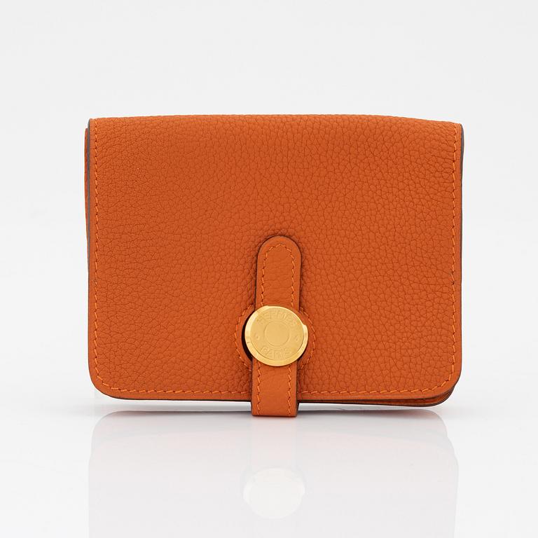 Hermès, a orange leather 'Dogon' wallet, 2003.