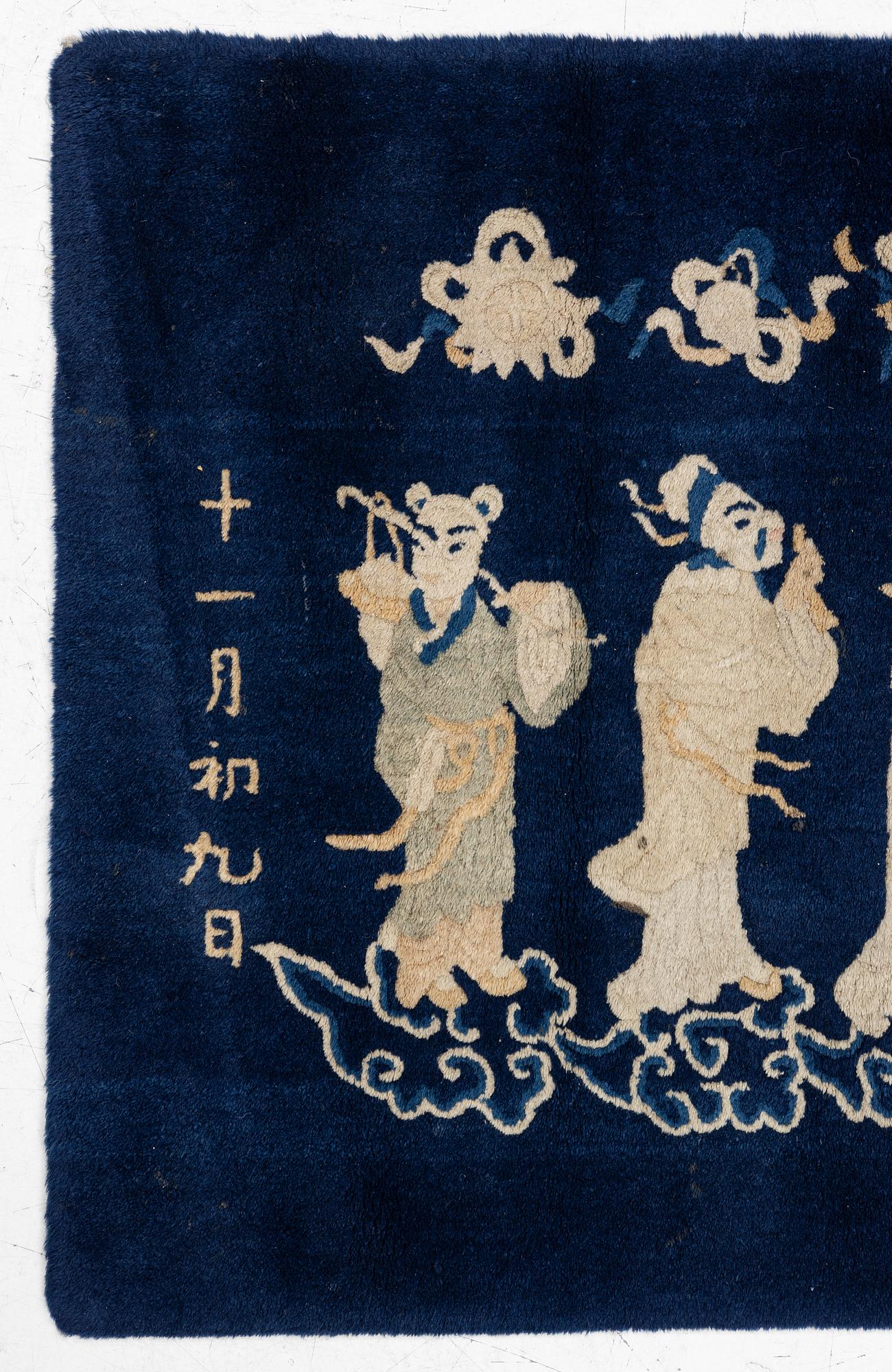 A Chinese 'immortals' carpet, Baotou, Measure: approx. 75 x 185 cm.
