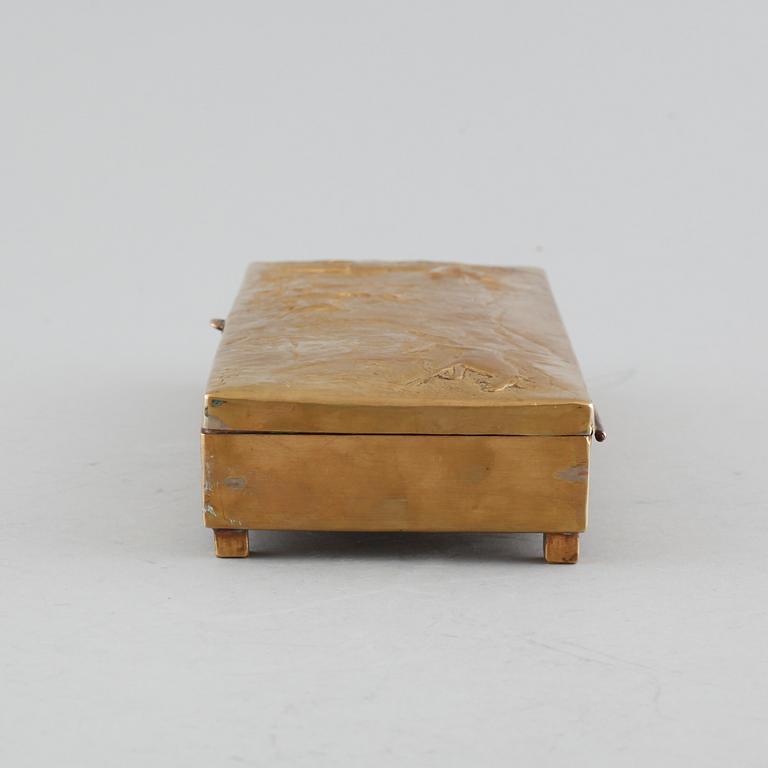 A brass coated copper cigarbox dated 1942 and signed B.S-n.