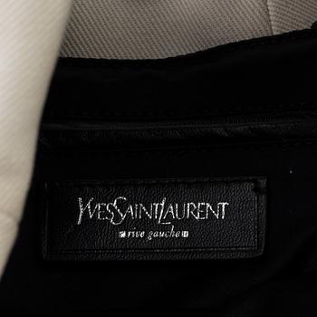 A vwite and black monogram hobobag by Yves Saint Laurent.