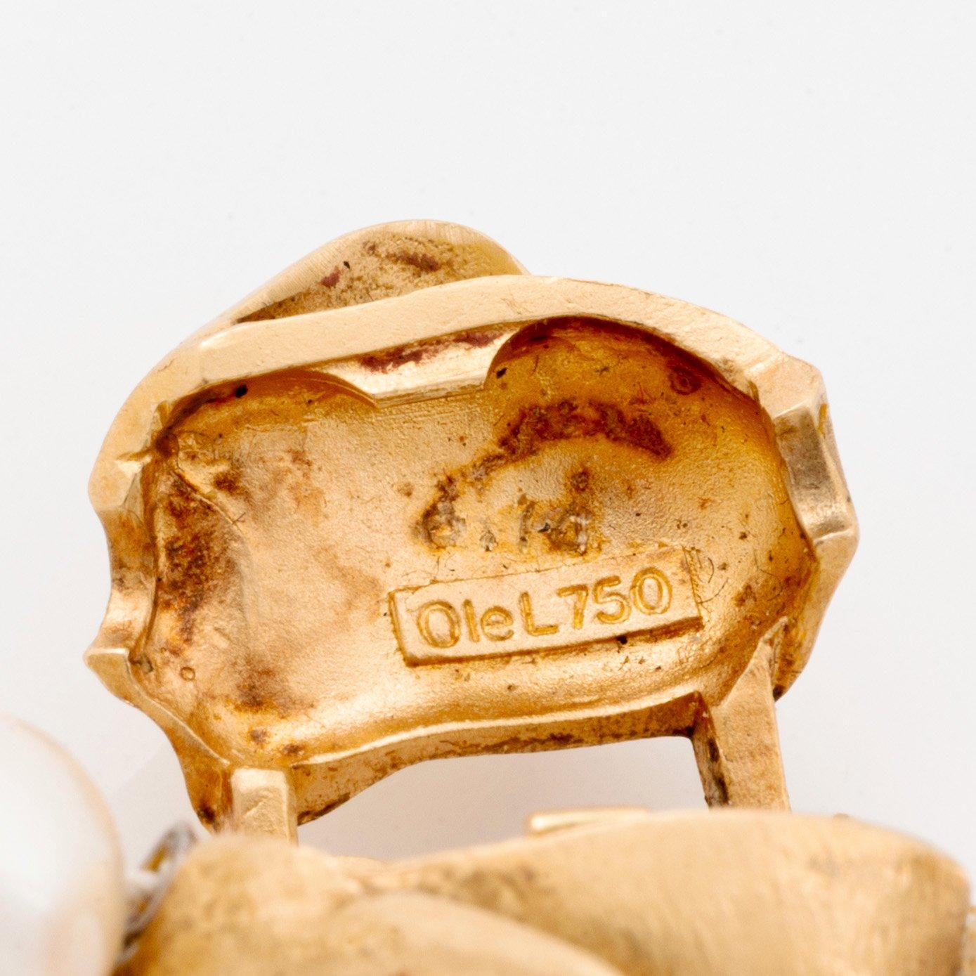 Ole Lynggard lås 18K guld med en rund briljantslipad diamant.