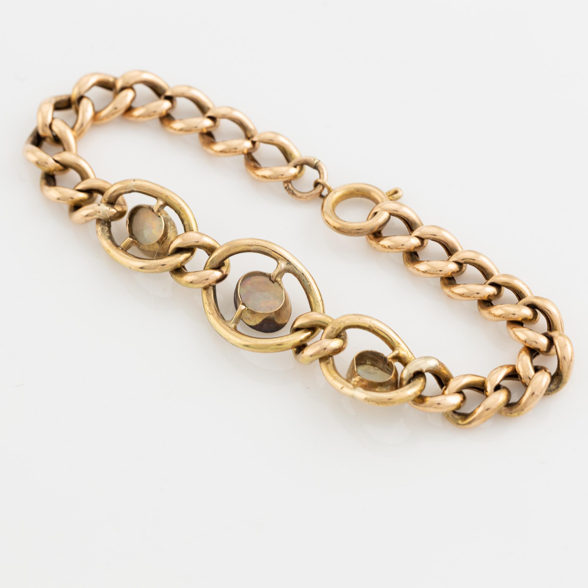 Gold and three opal bracelet.