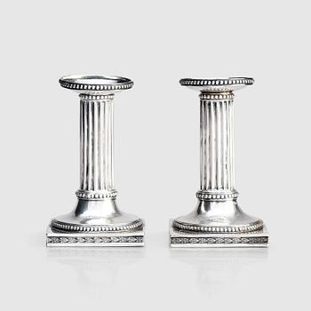 249. A Swedish pair of 18th century Gustavian silver candlesticks, marks of Johan Ekholm, Stockholm 1795.