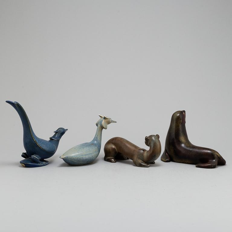 GUNNAR NYLUND, four stoneware figurines, from Rörstrand.