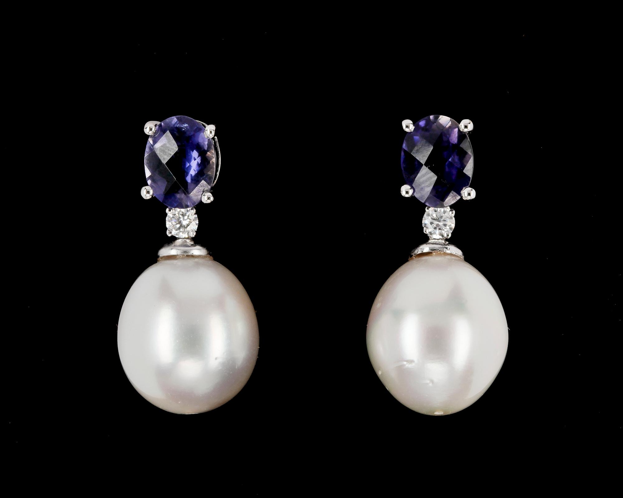 EARRINGS, iolites, brilliant cut diamonds and cultured South sea pearls.