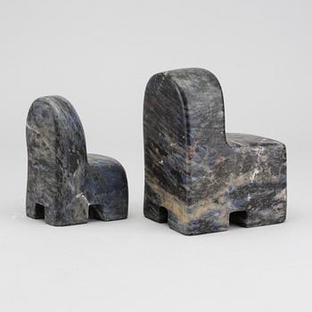 POUL ISBAK, a set of two signed and dated sculptures.