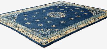 An antique Peking (Beijing) carpet, North China, c. 340 x 275 cm.