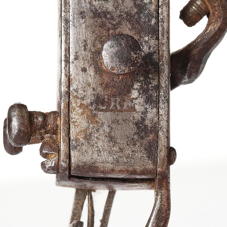 A mechanical flintlock igniter, later part 18th century/early19th century.
