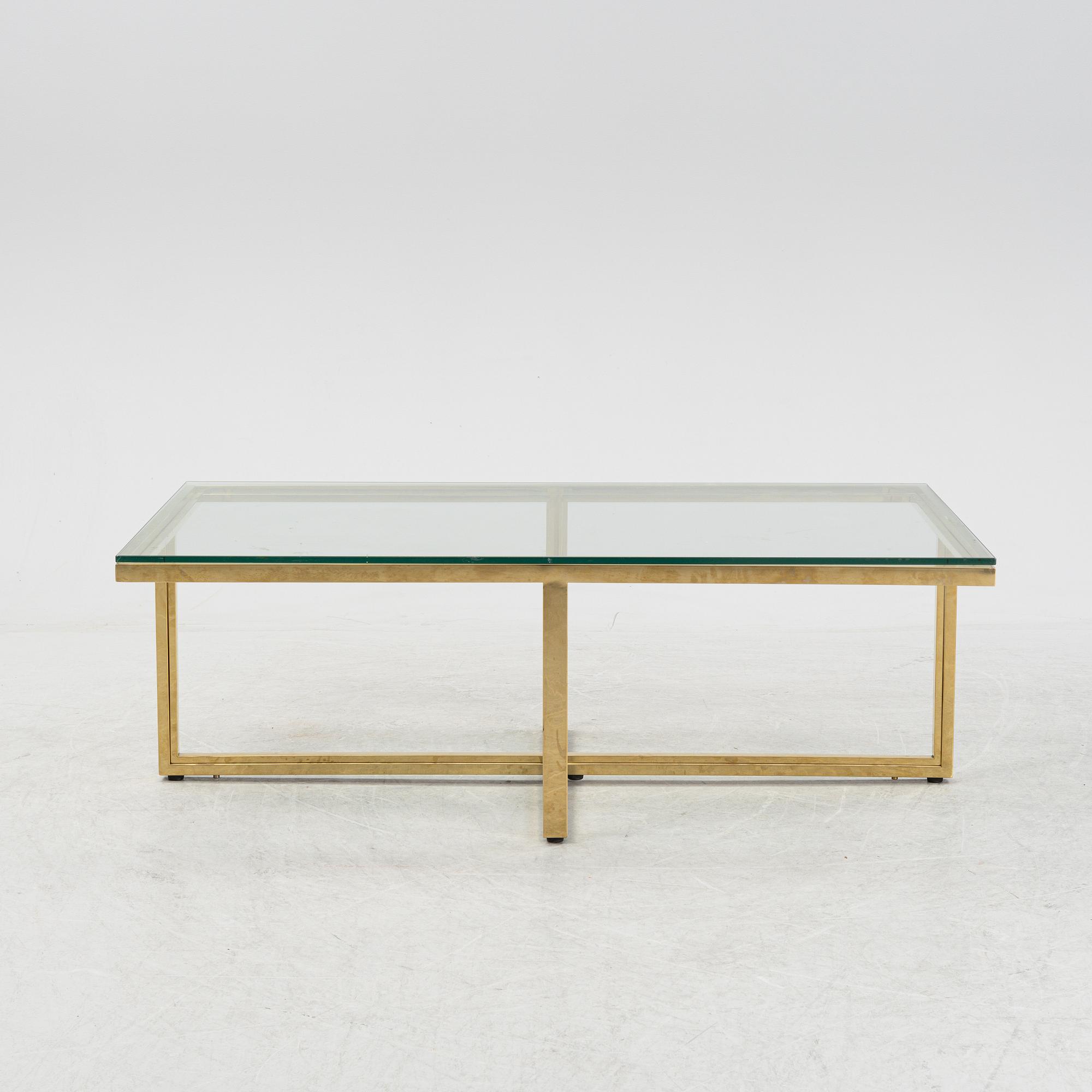 A 21st Century 5 pcs glass coffee table.