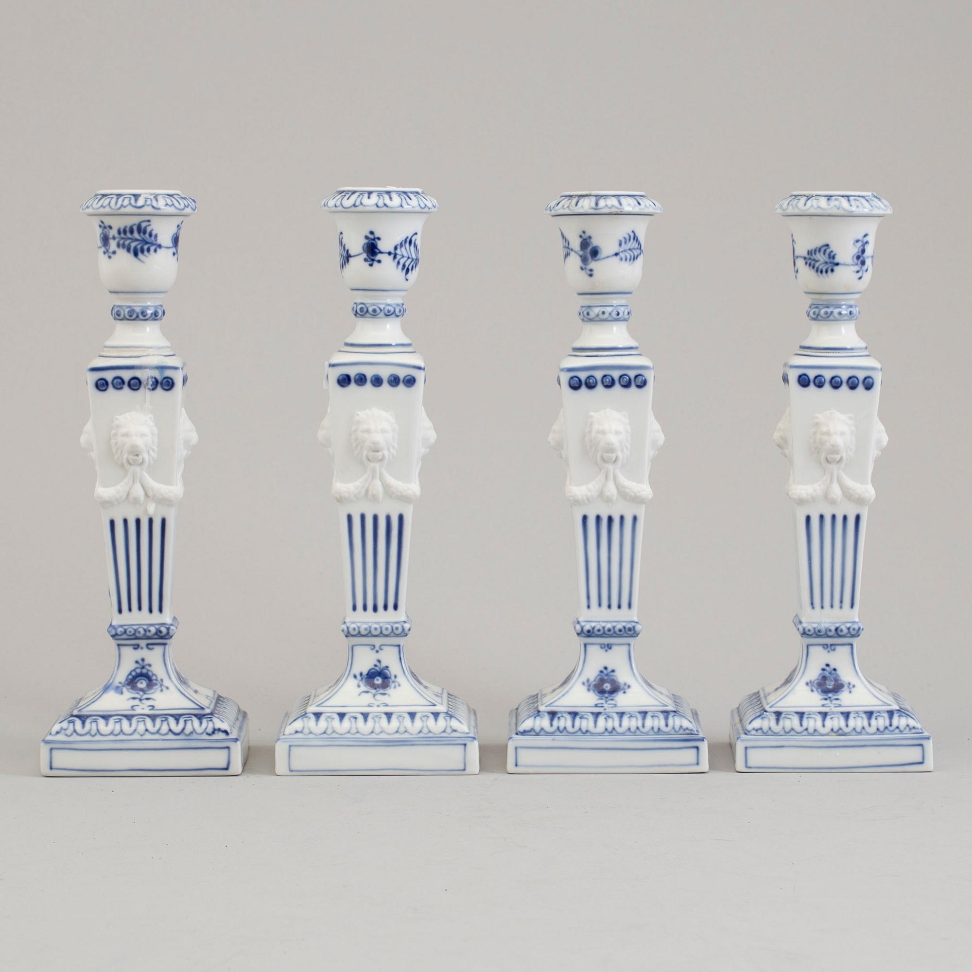 Two pairs of porcelain candlesticks by Royal Copenhagen, Denmark, third quarter of the 20th century.