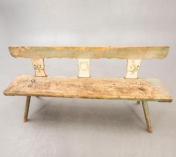 A painted early 1900s bench.