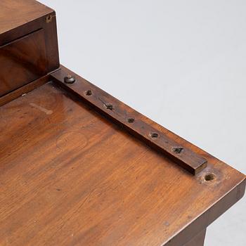 An Empire Dressing Table, first half of the 19th Century.