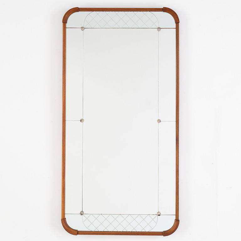 A teak veneered mirror.