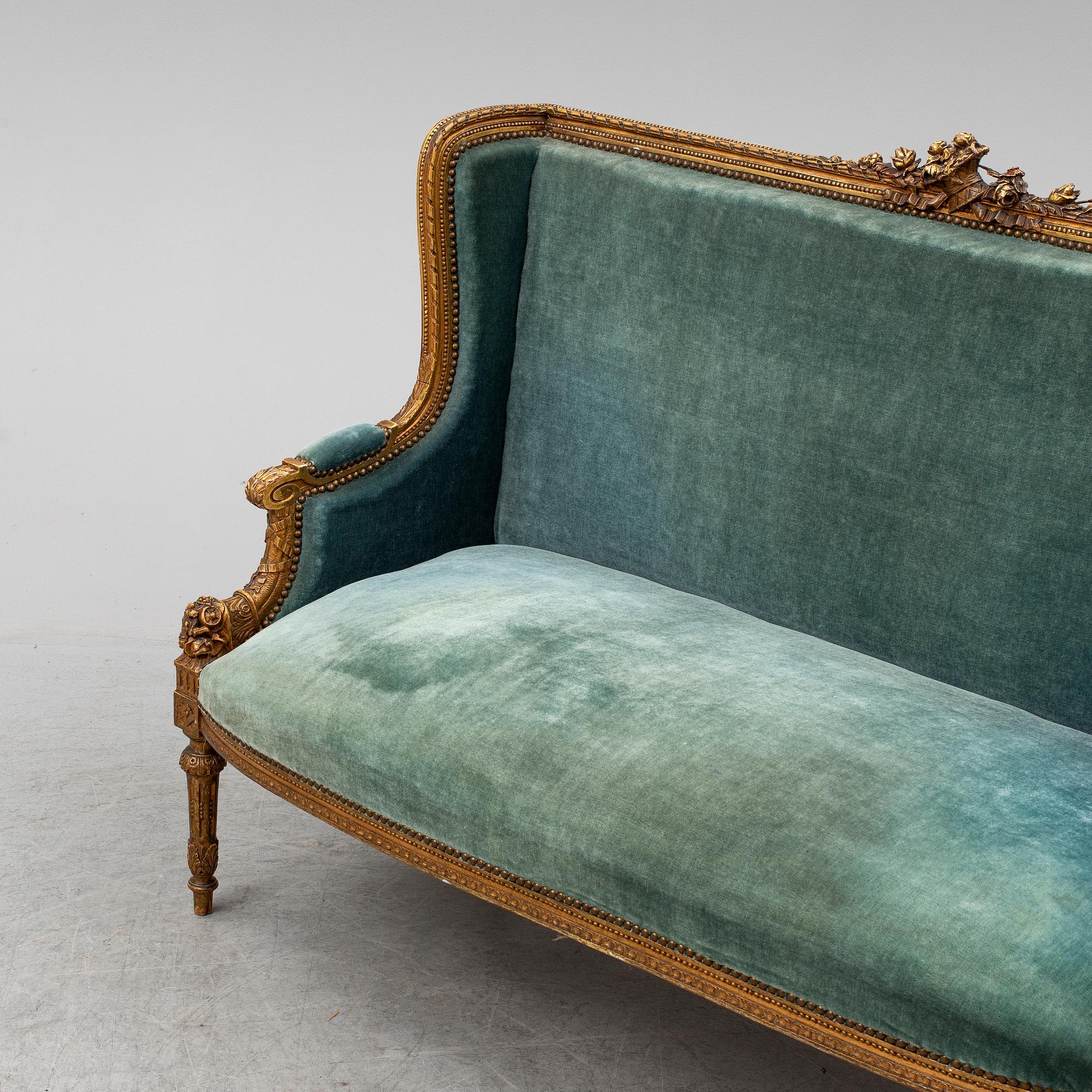 A Louis XVI-style sofa, ca 1900.