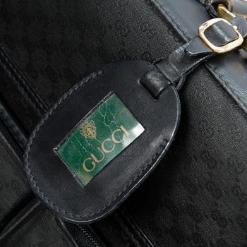 GUCCI, KLÄDÖVERDRAG SAMT VÄSKA, 1980-tal.