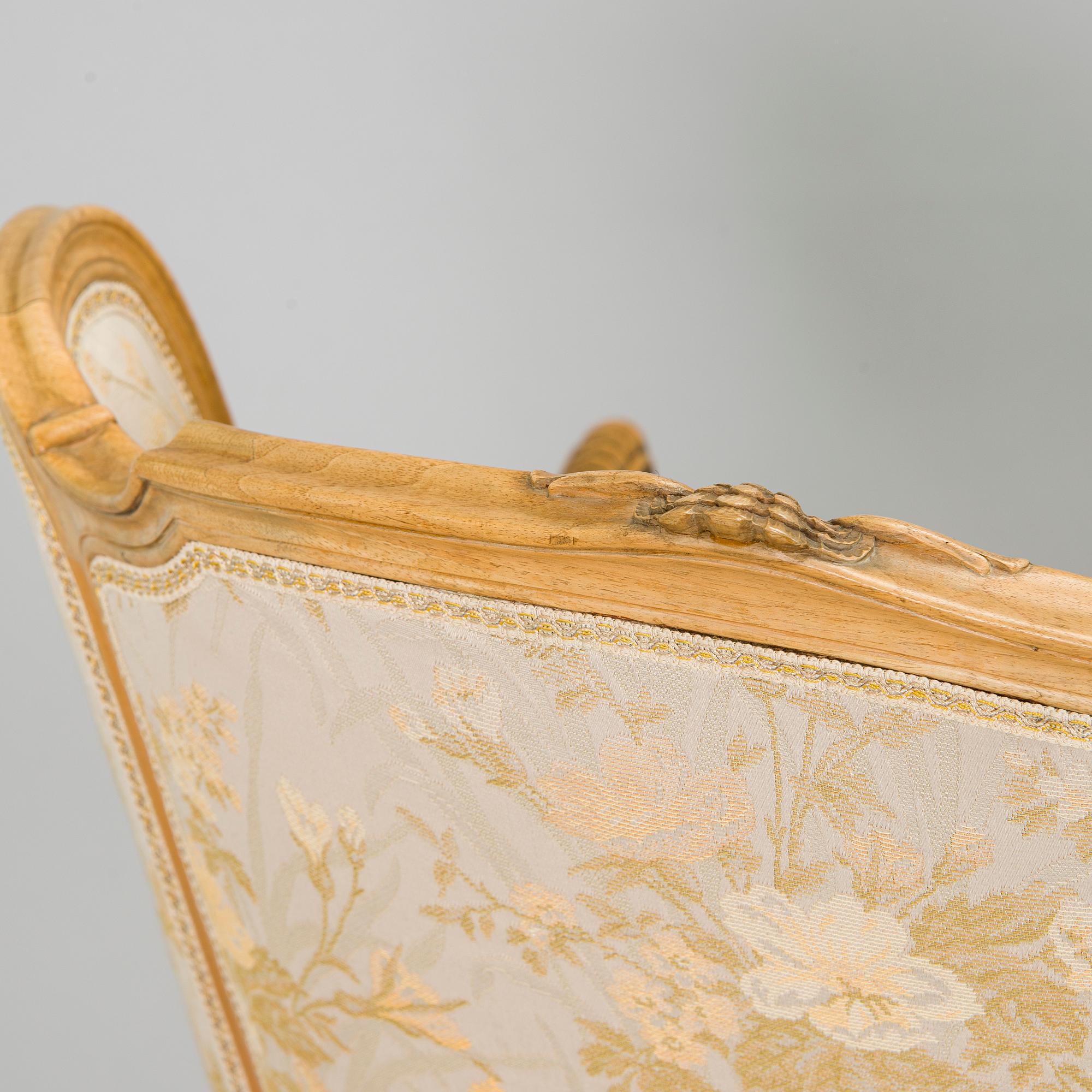 A pair of mid-20th-century French armchairs in Roccoco style.