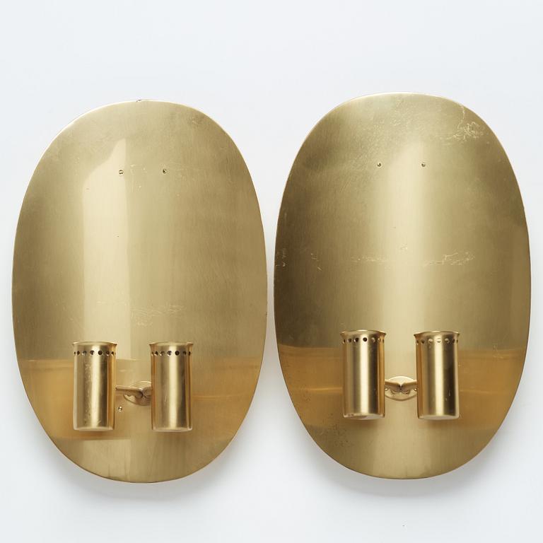 A pair of brass and glass wall sconces by Hans-Agne Jakobsson, Markaryd, second half of the 20th century.