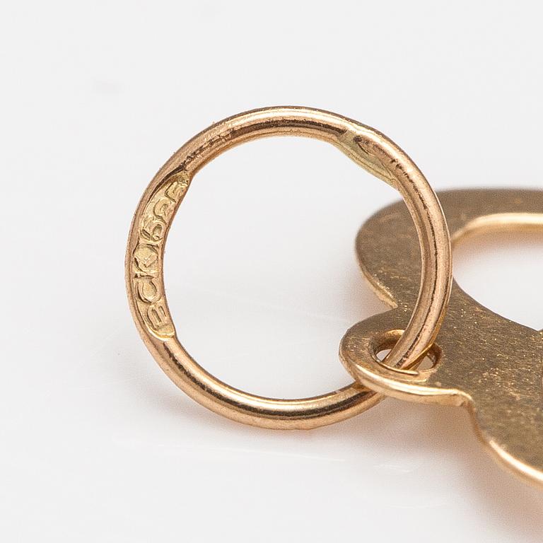 Two 14K gold pendants one with a diamond ca. 0.0025 ct.