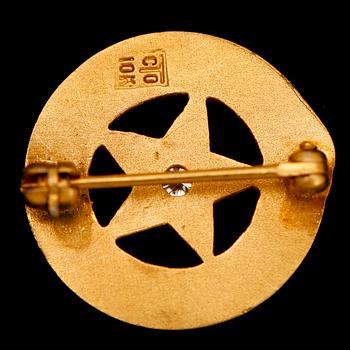 BROSCH, 10 k guld med liten briljant. Vikt ca 2 g.