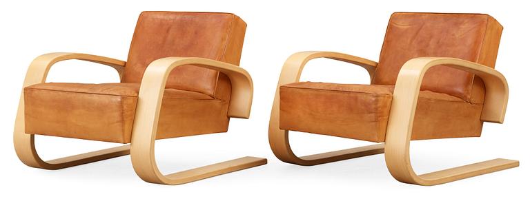 A pair of Alvar Aalto 'Nr 400' elk skin and birch armchairs, Artek, Finland.