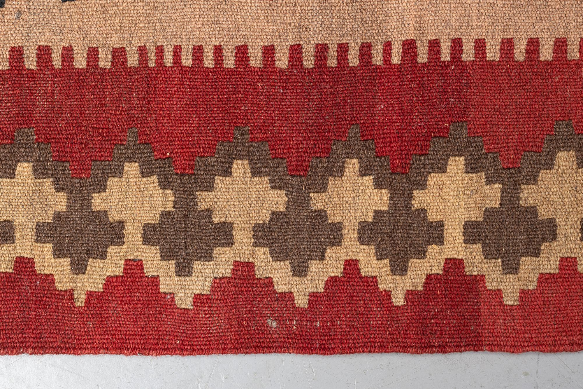 A carpet, a kilim, probably Veramin, ca 153 x 121,5 cm.