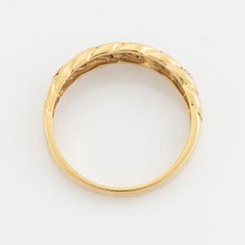 18K gold and small diamond ring.