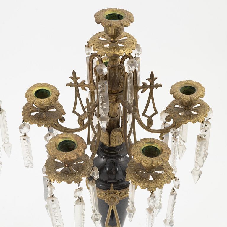 A pair of stone and gilt brass six-light candelabra, circa 1900.