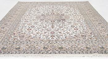 A Keshan carpet, signed, c. 405 x 290 cm.