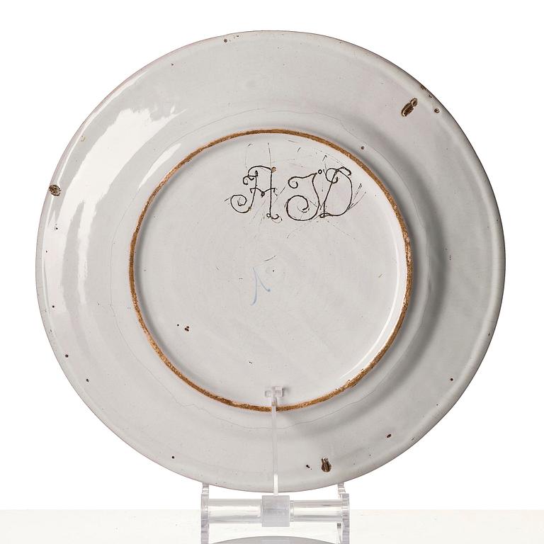 A Swedish faience charger, 18th century.