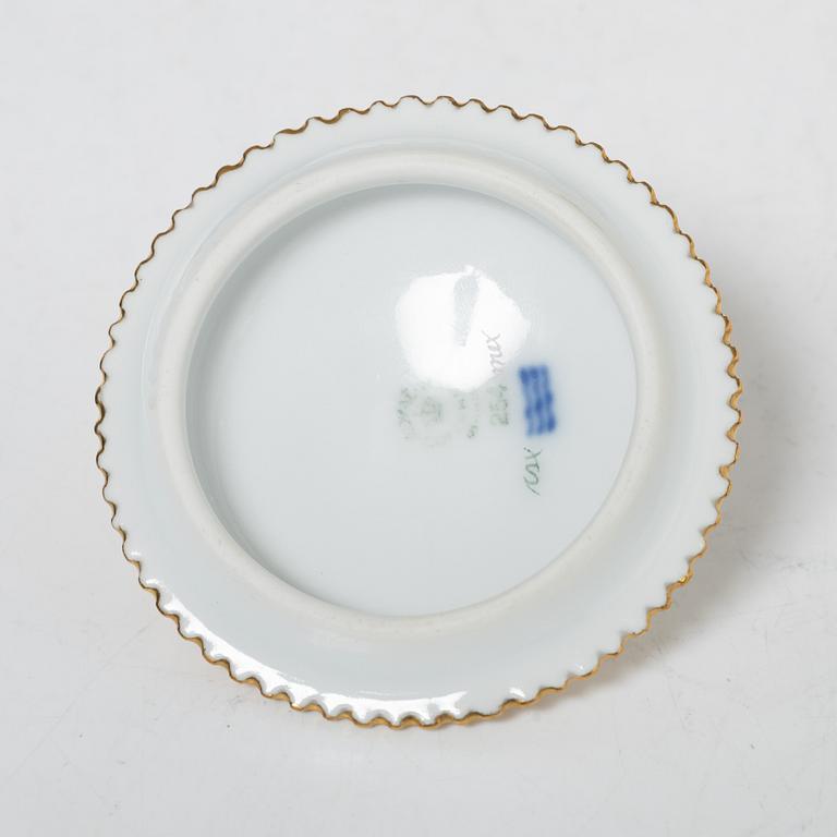 Royal Copenhagen, cream jug with lid and saucer, as well as coffee cup with saucer, porcelain, Flora Danica, Denmark.