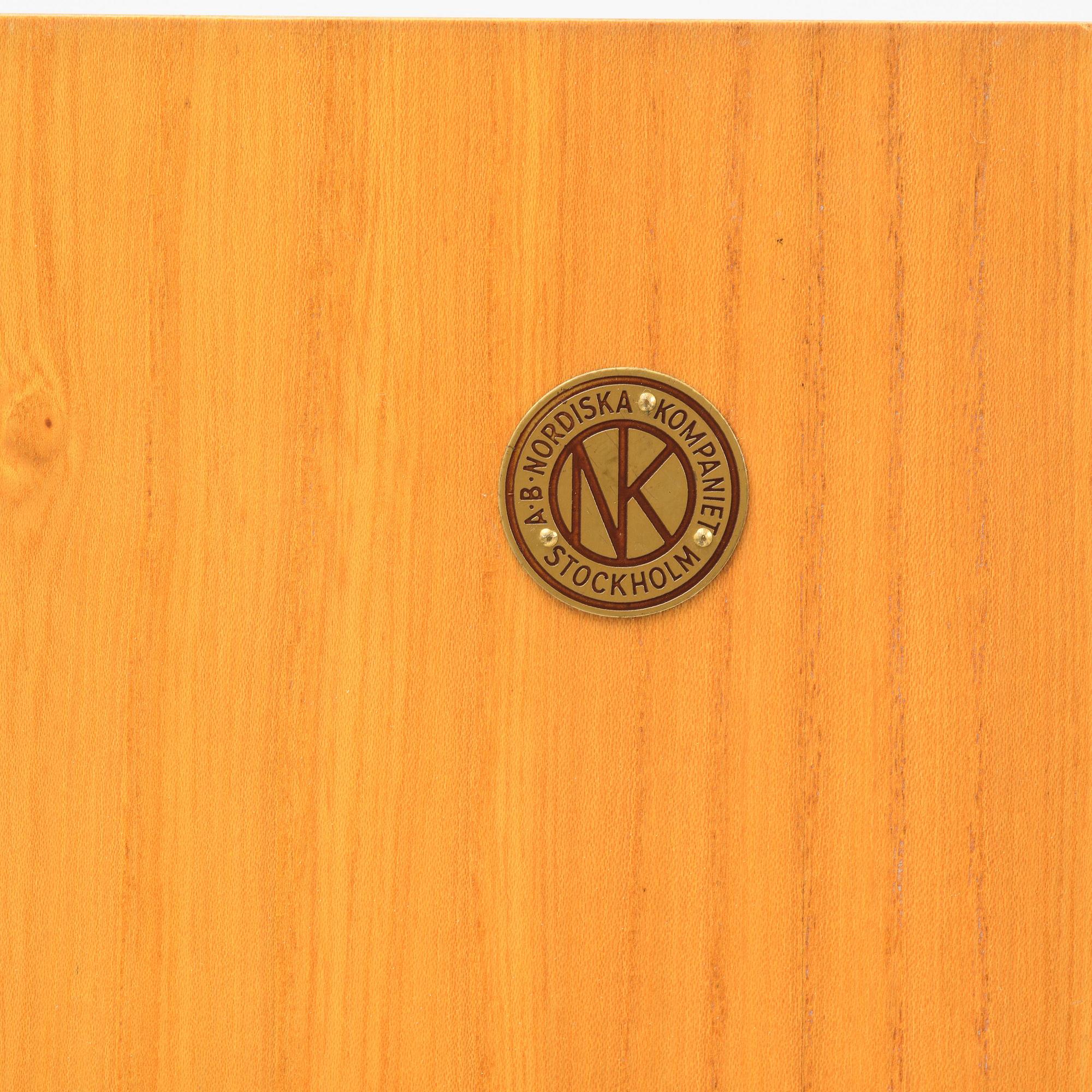 Nordiska Kompaniet, an elm veneered cabinet, Sweden, 1930s-40s.