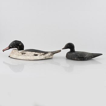 A set of six wooden duck decoys, 20th century.