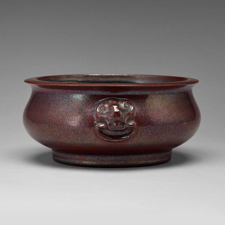 A red glazed censer, Qing dynasty, 19th Century.