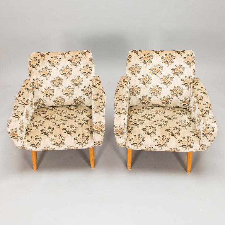 A pair of 1950s / 60s armchairs.