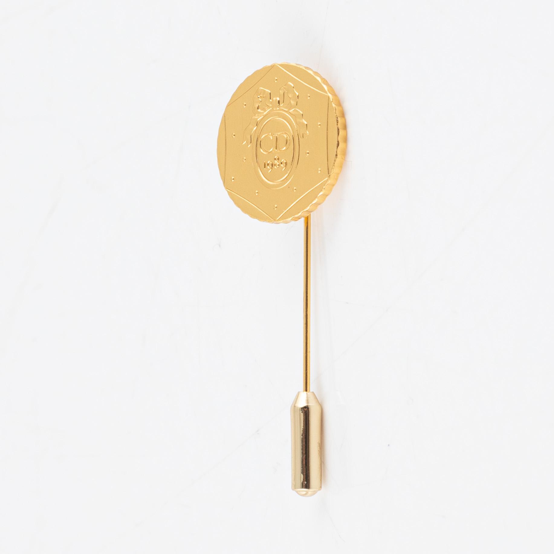 Christian Dior, necklace and pin.