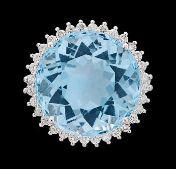 1088. RING, rund fasettslipad blå topaz, ca 12 ct, med briljantslipade diamanter, tot. 0.50 ct.