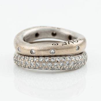 Ole Lynggaard two "Love" rings no. 4 in 18K white gold with round brilliant-cut diamonds.