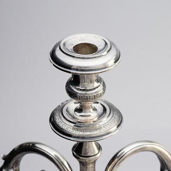 A pair of Swedish 19th century silver candelabra, marks of Gustaf Theodor Folcker, Stockholm 1871.