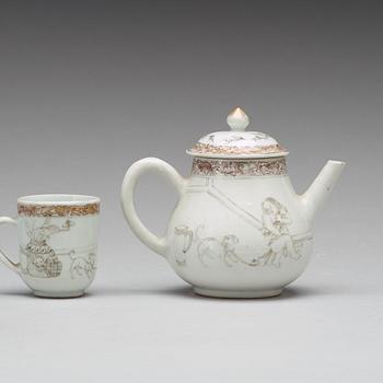 A grisaille and gold tea pot with cover and cup, Qing dynasty, Yongzheng (1723-35).