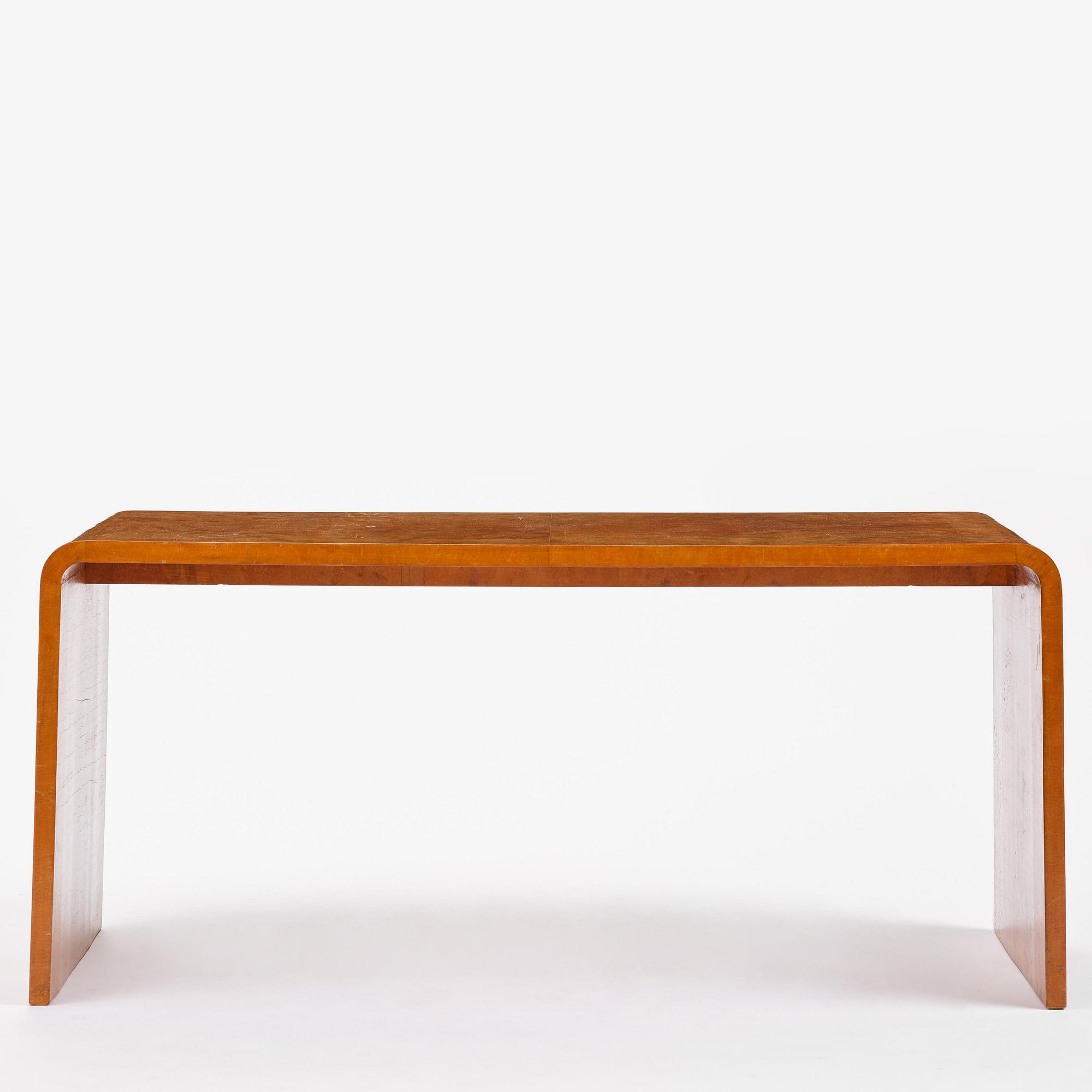 Swedish Modern, a birch veneered coffee table, 1930s-40s.