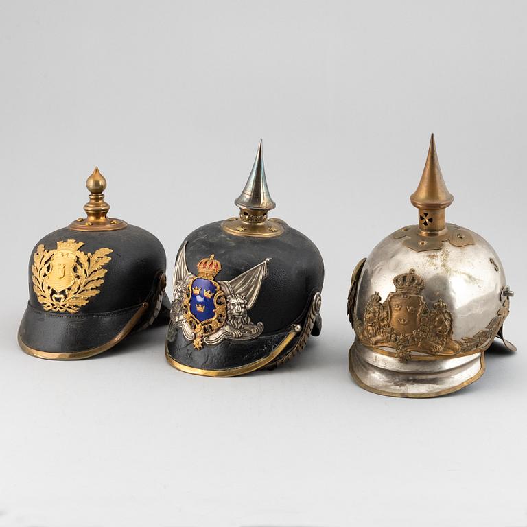 Three Swedish military helmets.