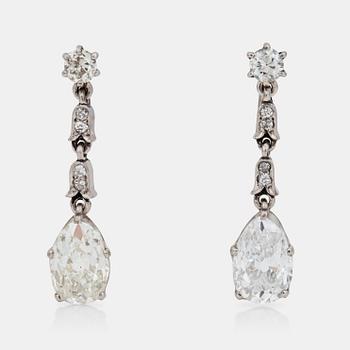 502. A pair of pear shaped and brilliant-cut diamond earrings. Made by Swedish court jeweller W.A. Bolin, Stockholm 1953.