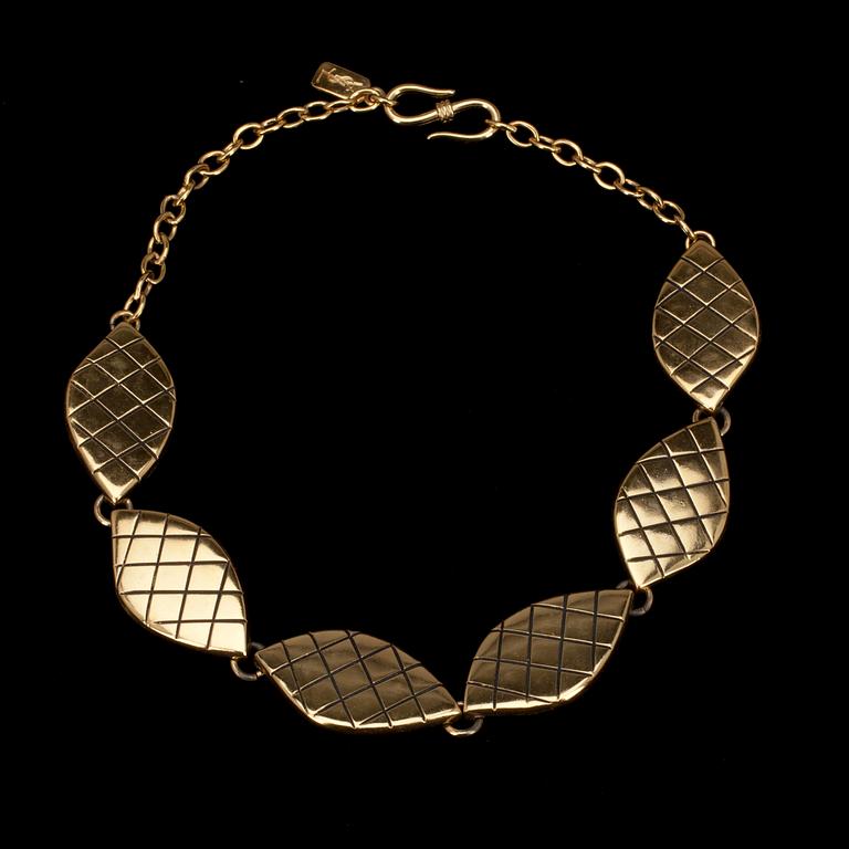 PUKUKORU, 3 osaa, Yves Saint Laurent.