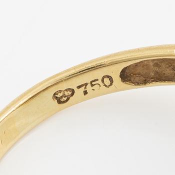 Ring, in the form of a panther, 18K gold with diamonds, sapphires, rubies, and emeralds.